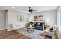 Inviting living room featuring modern furniture, stylish decor, hardwood floors, and recessed lighting at 1818 Arlene Dr, Indianapolis, IN 46219