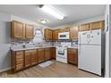 Functional kitchen featuring ample cabinet space and essential appliances at 2868 Tindall St, Indianapolis, IN 46203