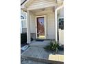 Close-up of the front door with glass panel and visible address at 5451 Kelvington Ln, Indianapolis, IN 46254