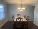 Dining room area with a table and chairs at 5801 Safari Dr, Indianapolis, IN 46237