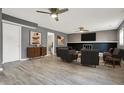 Spacious living room with modern fireplace, neutral gray walls, and stylish furnishings at 1852 W 62Nd St, Indianapolis, IN 46260