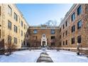 Beautiful courtyard with symmetrical landscaping and classic architecture at 5347 N College Ave # 311, Indianapolis, IN 46220