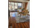 Charming dining room with hardwood floors and views of the backyard at 5506 N Drexel Ave, Indianapolis, IN 46220