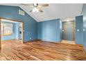 Spacious living room features wood floors, high ceilings, and natural light at 1135 Sherwood Dr, Danville, IN 46122