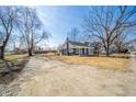 Lovely home with a well-maintained exterior, spacious yard and a long driveway at 227 W 7Th St, Lapel, IN 46051