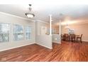 Open concept living room and dining area with hardwood floors at 5815 Noble Dr, Indianapolis, IN 46234