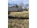 Spacious backyard with a detached garage and plenty of room for outdoor activities at 9555 Port Royal Dr, Martinsville, IN 46151