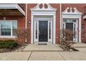Inviting entryway to brick townhome at 1072 3Rd Nw Ave, Carmel, IN 46032