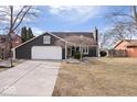 Charming home with two-car garage, landscaped yard, and well maintained lawn at 5595 Ridge Hill Way, Avon, IN 46123
