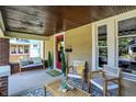 Relaxing front porch with ample seating and classic design at 4029 Broadway St, Indianapolis, IN 46205