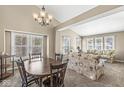 Cozy living room with large windows and a comfortable seating area at 4947 Cherryhill Ct, Indianapolis, IN 46254