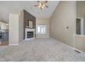 Inviting living room featuring a classic fireplace and a cozy atmosphere for relaxing evenings at home at 10944 Haig Point Dr, Fishers, IN 46037