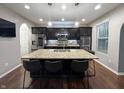 Spacious kitchen with granite countertops, stainless steel appliances, and a large island at 1566 Dorset Dr, Avon, IN 46123