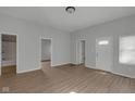 Bright living room featuring hardwood floors, neutral paint, and natural light at 2014 Barth Ave, Indianapolis, IN 46203