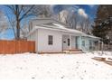 Charming home featuring a quaint covered porch and a well maintained yard at 2639 E Brookside Ave, Indianapolis, IN 46218