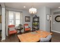 Bright home office featuring a large desk, cozy seating, and a window with natural light at 3982 Abbotsford Dr, Westfield, IN 46074