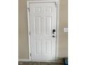 Solid front door with modern lock hardware at 5455 Lalista Ct, Indianapolis, IN 46254
