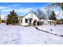 Classic home exterior with a tidy yard and an inviting entrance at 5502 Rawles Ter, Indianapolis, IN 46219