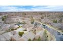 Aerial view of the home on waterfront, showing the property's location and surroundings at 8545 Olde Ml Trce, Indianapolis, IN 46260