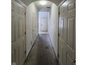 Hallway that features multiple doors and white walls at 1017 Grovewood Dr, Beech Grove, IN 46107