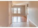 Inviting foyer leading to a bright living space with natural light and hardwood floors at 14461 Brook Meadow Dr, McCordsville, IN 46055