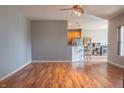 Spacious living room with hardwood floors and a view of the kitchen and dining area at 14461 Brook Meadow Dr, McCordsville, IN 46055