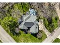 Aerial view of the home, its backyard, and the surrounding neighborhood at 8845 Otter Cove Cir, Indianapolis, IN 46236