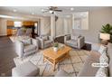 Bright, open living room with modern furnishings and hardwood floors at 14466 Bramkrist Dr, Fishers, IN 46038