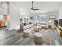 Bright living room featuring modern furniture, hardwood floors and ample natural light at 2219 Rosswood Blvd, Indianapolis, IN 46229