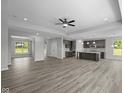 Spacious living area with hardwood floors, recessed lighting and views of the kitchen at 10502 Oak Bend Blvd, Indianapolis, IN 46239