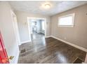 Open-concept living room featuring modern flooring and ample natural light at 1421 Shepard St, Indianapolis, IN 46221