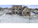 Charming brick two-story home featuring gabled roof, tidy front yard, and tasteful landscaping at 16645 Carlton Ct, Westfield, IN 46074