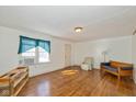 Spacious living room with hardwood floors, natural light, and a cozy seating area, perfect for a relaxing atmosphere at 189 S St Clair St, Martinsville, IN 46151