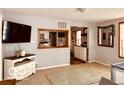 Cozy living room featuring neutral decor and a pass-through to the kitchen for seamless entertaining at 609 Powell St, Lebanon, IN 46052