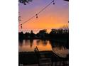 Serene outdoor space overlooking a tranquil lake, perfect for relaxation and enjoying sunsets at 9266 Backwater Dr, Indianapolis, IN 46250