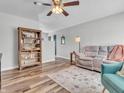 A cozy living room featuring modern flooring, comfortable furniture, and an open layout at 930 Edgewood Dr, Mooresville, IN 46158