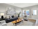 Well-decorated living room featuring contemporary furnishings, stylish decor, and ample natural light at 1624 Prospect St, Indianapolis, IN 46203