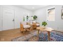 Cozy living room featuring white walls, wood floors, and comfortable seating at 509 St Paul St, Indianapolis, IN 46203