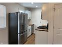 Modern kitchen featuring stainless steel appliances and butcher block countertops at 6018 Ivanhoe St, Indianapolis, IN 46219