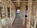 Hallway features an open-concept layout, and wooden framing at 640 Firefly Ct, Greenfield, IN 46140