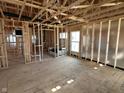 Spacious living room with a framed window layout, awaiting personalization at 640 Firefly Ct, Greenfield, IN 46140