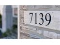 Close-up of the house number '7139' on a stone background at 7139 Prelude Rd, Brownsburg, IN 46112