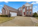 Well-maintained brick home with attached two car garage at 845 Harvest Lake Dr, Brownsburg, IN 46112