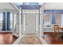 Grand foyer with soaring ceilings and beautiful tile flooring at 845 Harvest Lake Dr, Brownsburg, IN 46112