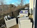 Outdoor patio featuring comfortable seating with stylish pillows and a glass table at 16046 Coleman Dr, Westfield, IN 46074