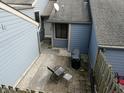 Overhead view of a private patio area, perfect for relaxation and entertainment with chair and grill at 193 Sugarwood Ln, Avon, IN 46123
