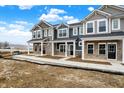 Attractive new townhomes with inviting entrances and meticulous landscaping in a vibrant community at 19517 Grassy Branch Rd, Westfield, IN 46074