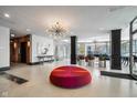 Bright, open lobby with modern lighting and seating areas offers a welcoming entrance at 3965 N Meridian St # Apt 2D, Indianapolis, IN 46208