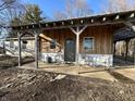 Charming home featuring a covered front porch and a welcoming entrance at 4516 Ridge Rd, Anderson, IN 46013