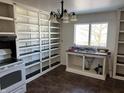 Kitchen with built in shelving, double bowl sink, and black and white color scheme at 338 A St, Wilkinson, IN 46186